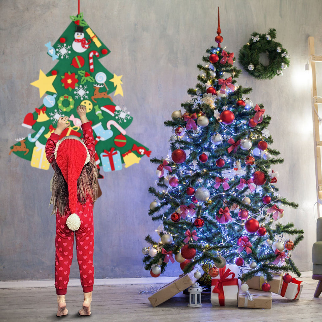 Close up of colorful felt ornaments including star snowman and Santa Claus pieces