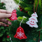 Wooden Christmas pendants arranged in decorative box ready for gifting