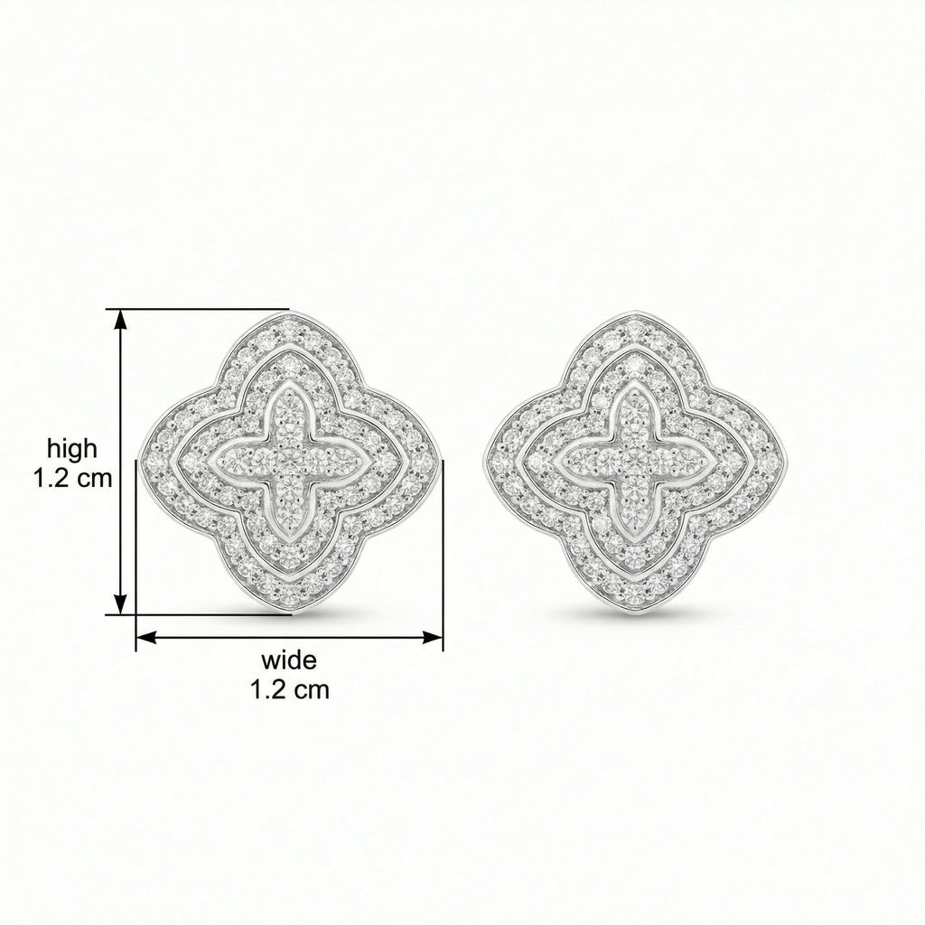 Polished white metal stud earrings with tiered diamond halos and faith-inspired design