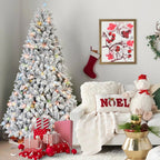 Glowing colored lights illuminating the branches of a flocked Christmas tree