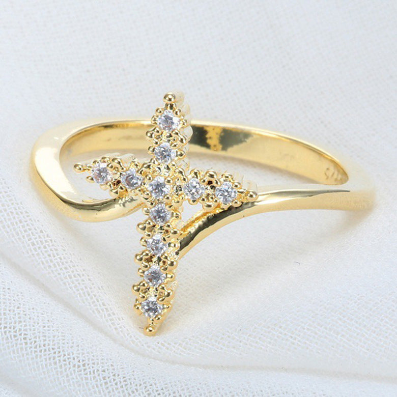 Close-up of copper Jesus Cross Ring showing detailed cross craftsmanship and warm finish
