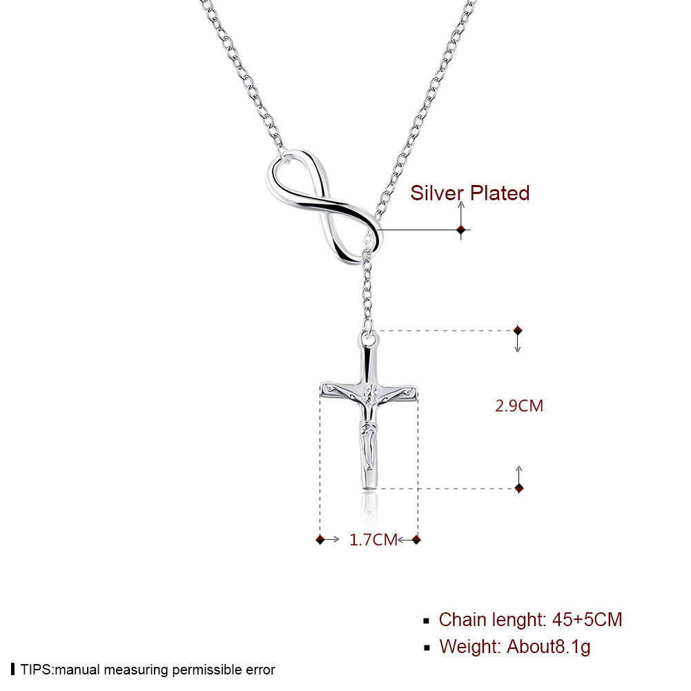 Close-up view of elegant cross pendant with warm copper finish