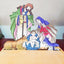 Wooden nativity scene decoration with hand-carved figures depicting Mary, Joseph, and baby Jesus in the manger