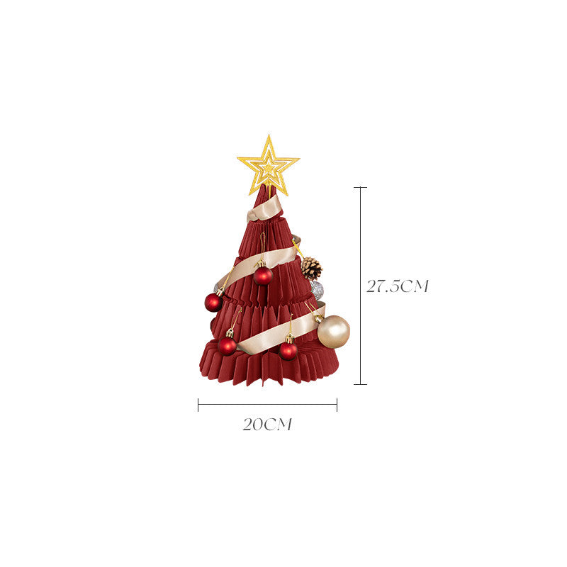 Paper origami Christmas tree ornament in elegant gift setting