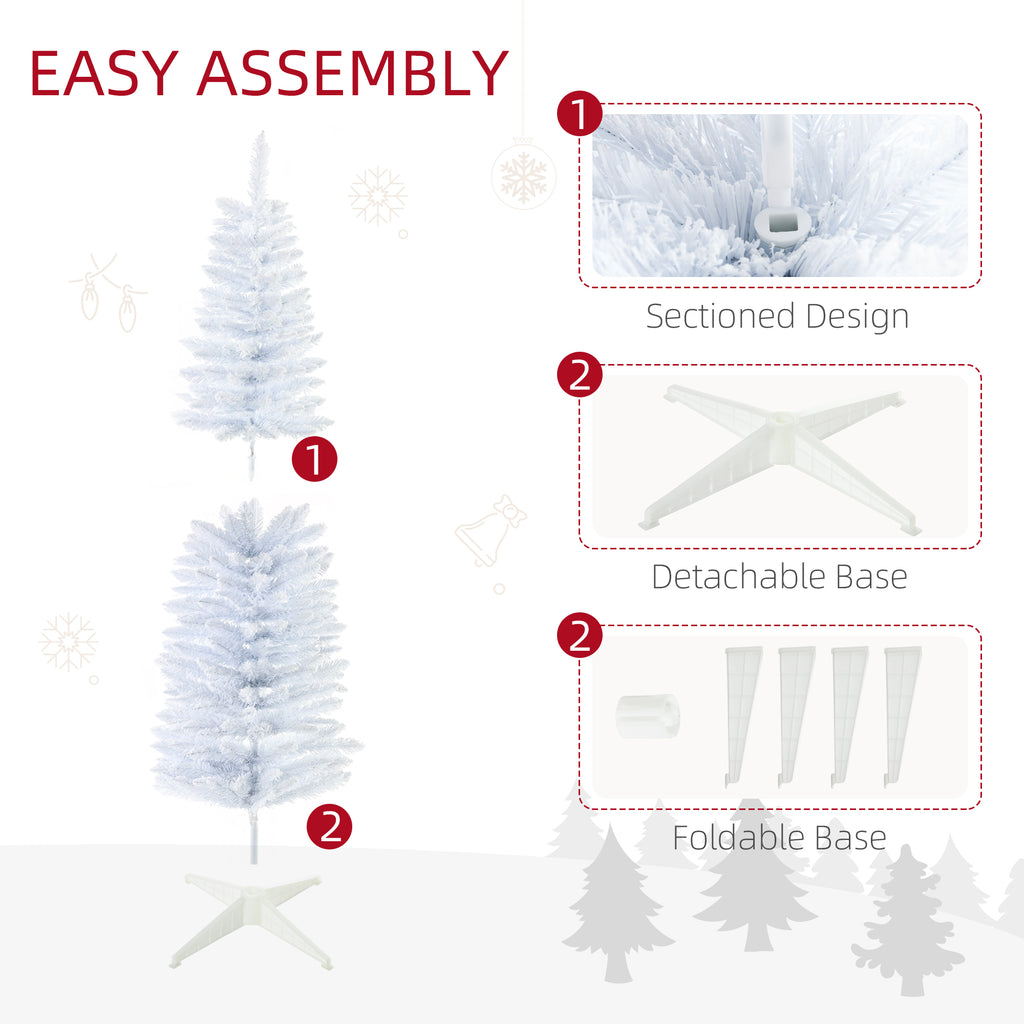 White Christmas tree displayed in a bright, airy room with natural light