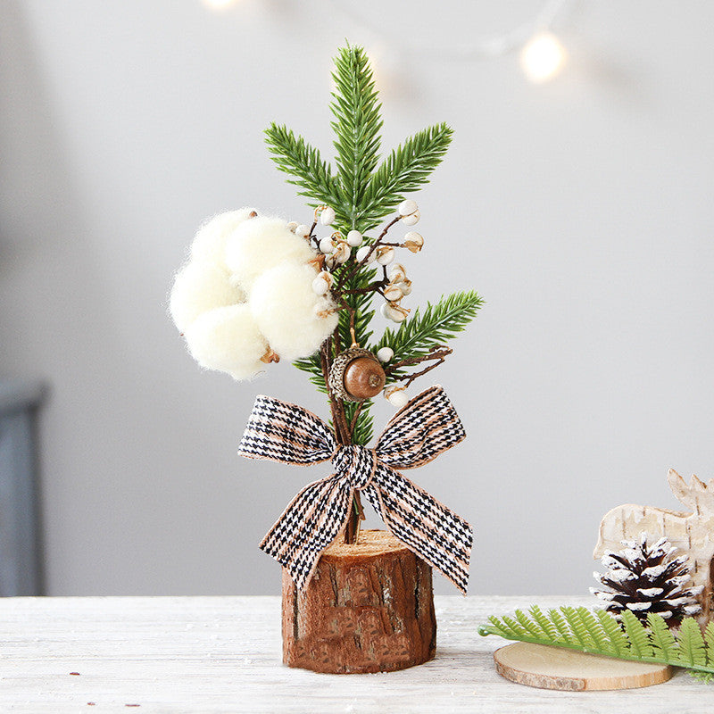 Small Christmas tree ornament with potted base ready for display