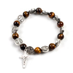 Saint Benedict Tiger Eye Rosary Bracelet with detailed view of Benedict cross pendant and spiritual symbol