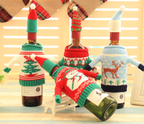 Joy design knitted bottle cover for festive Christmas entertaining
