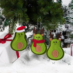 Set of three green felt Christmas tree pendants arranged together