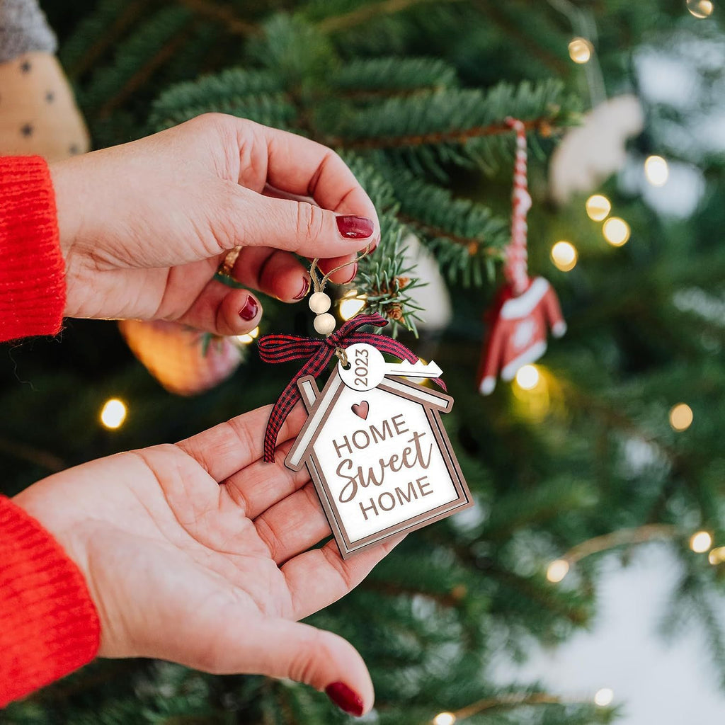 Wooden pendant ornament styled as decorative Christmas house scene