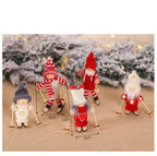 Wooden ski doll Christmas ornament featuring an old man skiing design