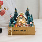 Christmas Eve cabin ornament with lantern light and forest details