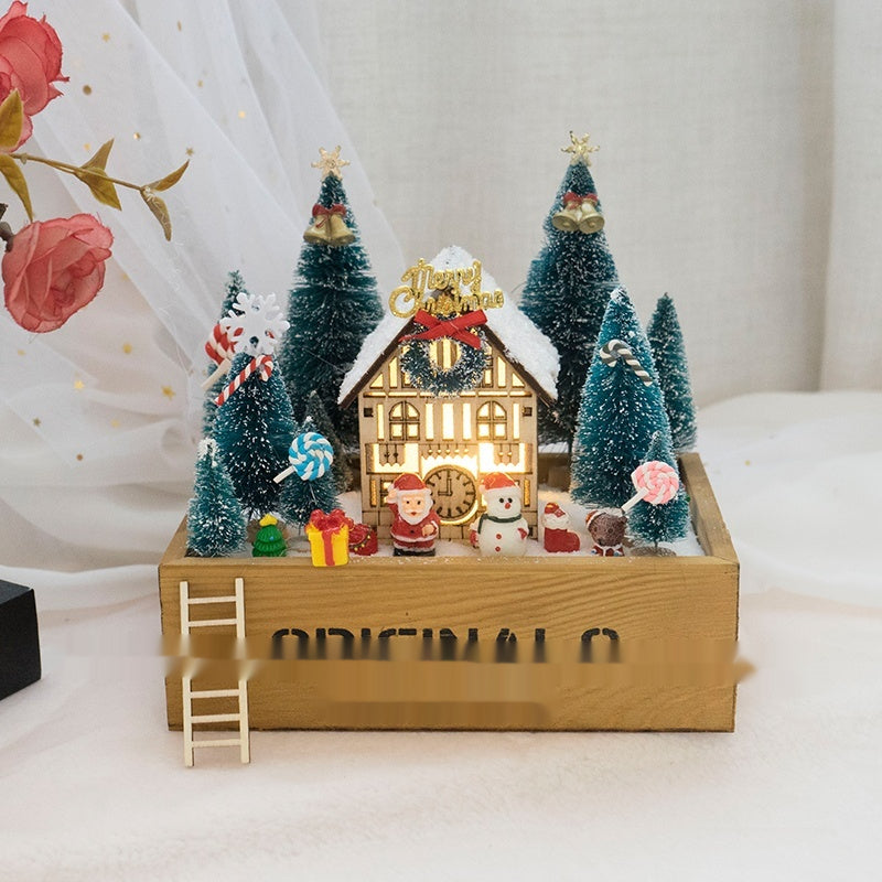 Christmas Eve cabin ornament with lantern light and forest details
