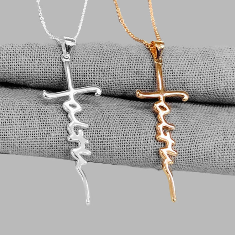 Close-up of copper cross pendant with religious charm detail