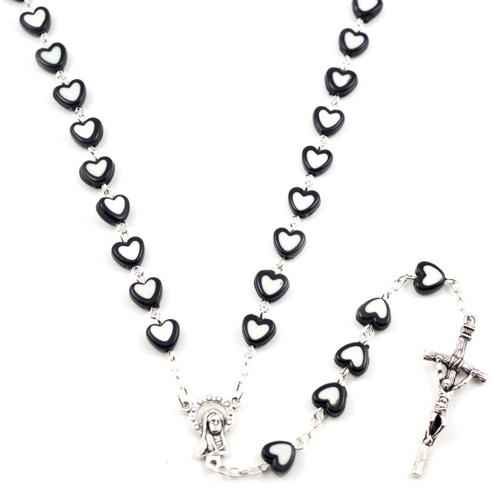 Colorful faith rosary necklace worn by young woman
