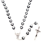 Colorful faith rosary necklace worn by young woman