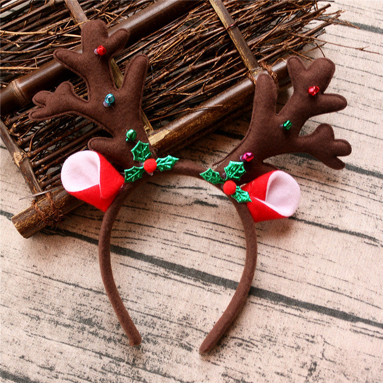 Antler headband bringing Christmas cheer to family celebrations