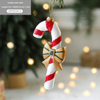 Set of painted plastic Christmas tree ornaments featuring candy designs