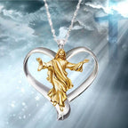 Close-up view of Love Jesus heart pendant with religious inscription detail