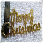 Gold plastic Christmas pendant arranged as holiday table decoration