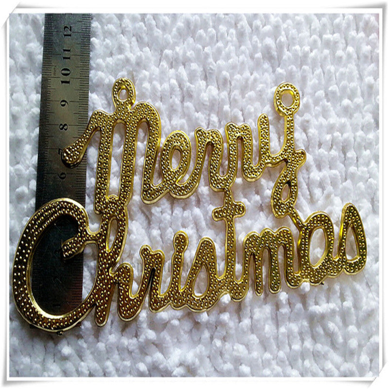 Gold plastic Christmas pendant arranged as holiday table decoration