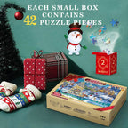 Stacked puzzle pieces in Christmas colors with holly decorations scattered around - Advent Calendar Puzzle