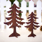 Wooden elk ornament with rustic finish displayed on a farmhouse style Christmas tree