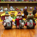 Set of three Christmas fabric decorations including snowman, elk, and Santa in festive colors