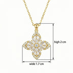 Elegant floral cross pendant with round center stone and sparkling crystal details in silver