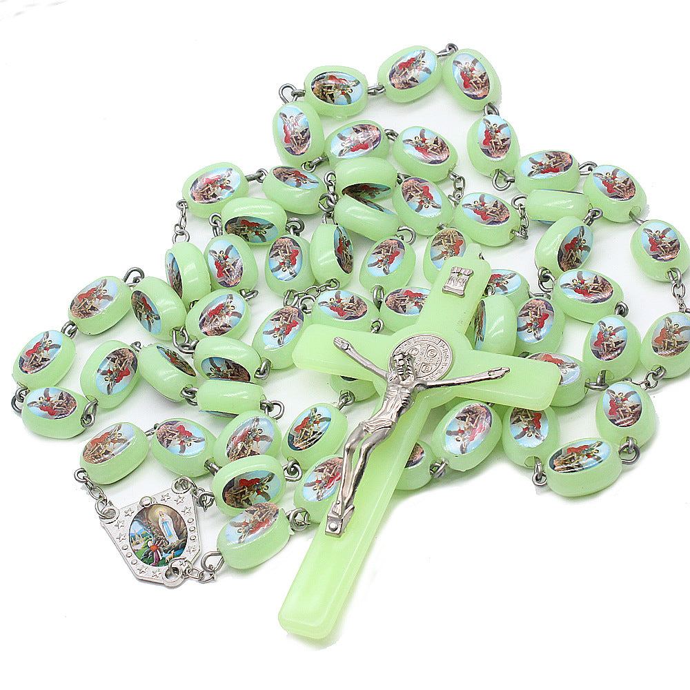 Luminous plastic rosary beads with crucifix pendant for Catholic devotion Main image