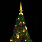 Decorated artificial Christmas tree with lights and baubles in living room setting