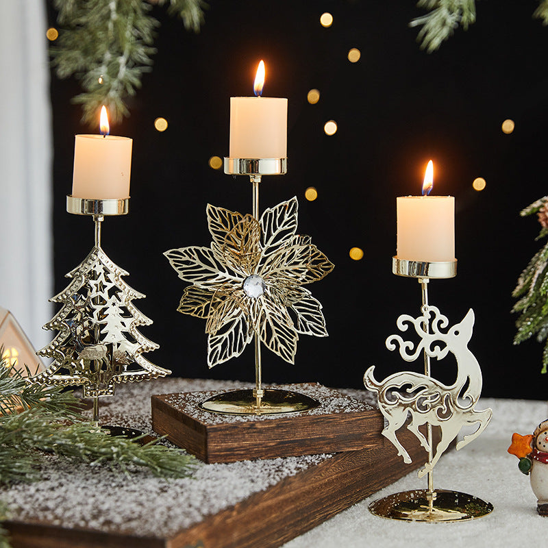 Romantic wrought iron Christmas candlestick with snowflake design on rustic surface