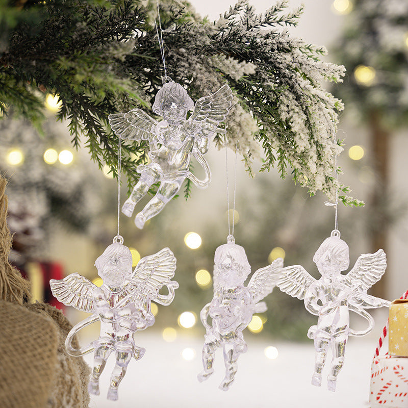 Transparent acrylic angel hanging on Christmas tree branch