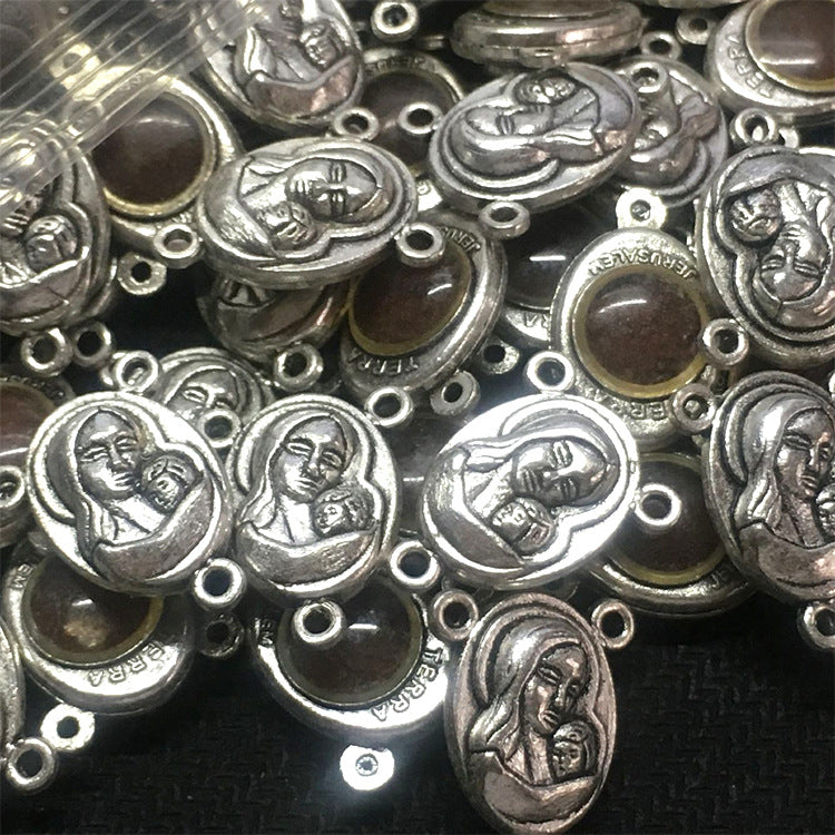 Small Mary and Jesus charm detailed image sacred jewelry