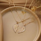 Gold electroplated twin heart pendant necklace with Jesus pattern detail