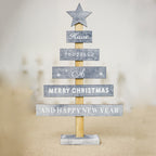 Christmas tree decorated with letter ornaments