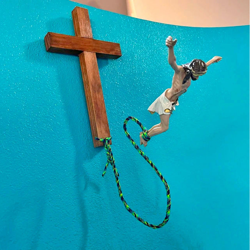 Home decor crucifix with bungee cord on black resin base