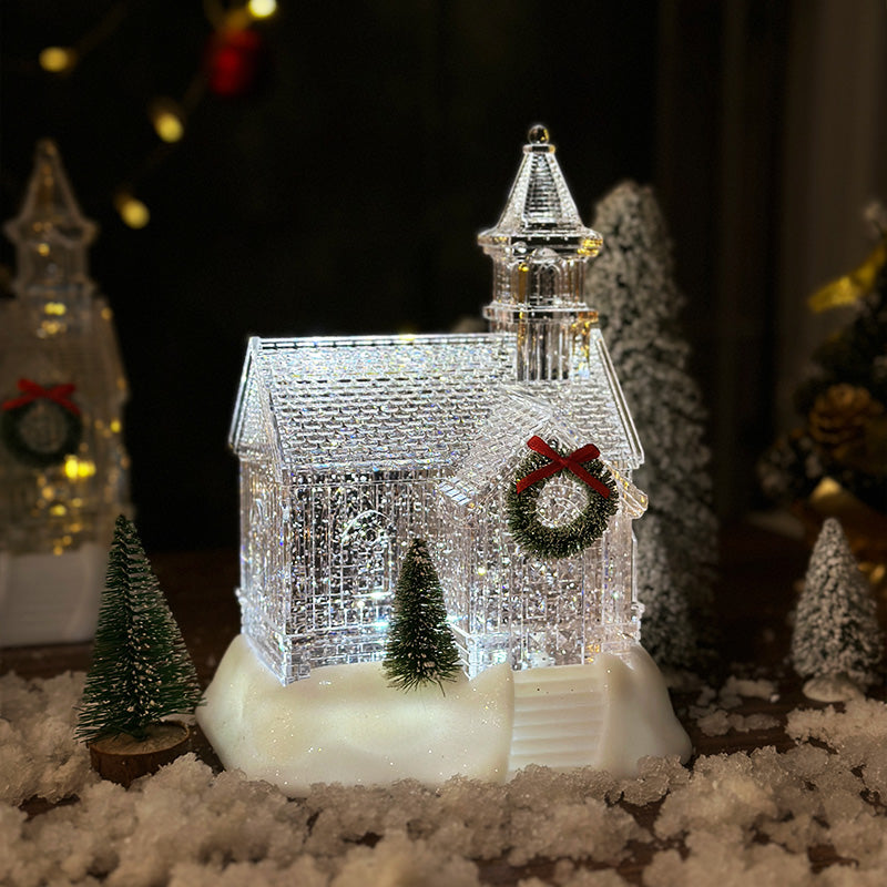 Pink Christmas Crystal House with soft luminous glow on wooden surface