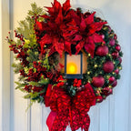 Illuminated Christmas wreath garland featuring Jesus motif with warm glowing lights for holiday decor