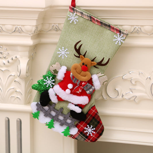 Linen Christmas stocking gift bag displayed as holiday decor