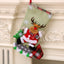 Linen Christmas stocking gift bag displayed as holiday decor