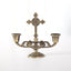 Zinc alloy cross candle holder ornament displayed on a wooden surface for prayer and devotion