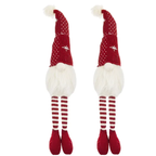 Christmas gnome decorations in white and red celebrating the holiday season
