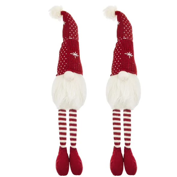 Christmas gnome decorations in white and red celebrating the holiday season
