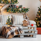 Close-up of small artificial Christmas tree with holiday charm