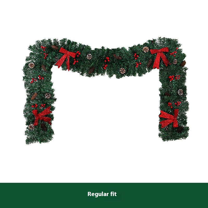 Christmas rattan decoration featuring pine cones and bow set against neutral background