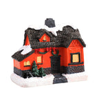 Cozy holiday village ornament in durable resin material