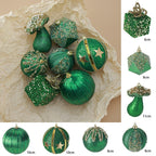 Green Christmas ball ornament hanging among tree branches