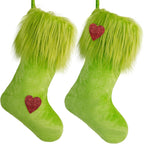 Cozy plush Christmas stocking ornament in warm holiday setting with soft fabric detail