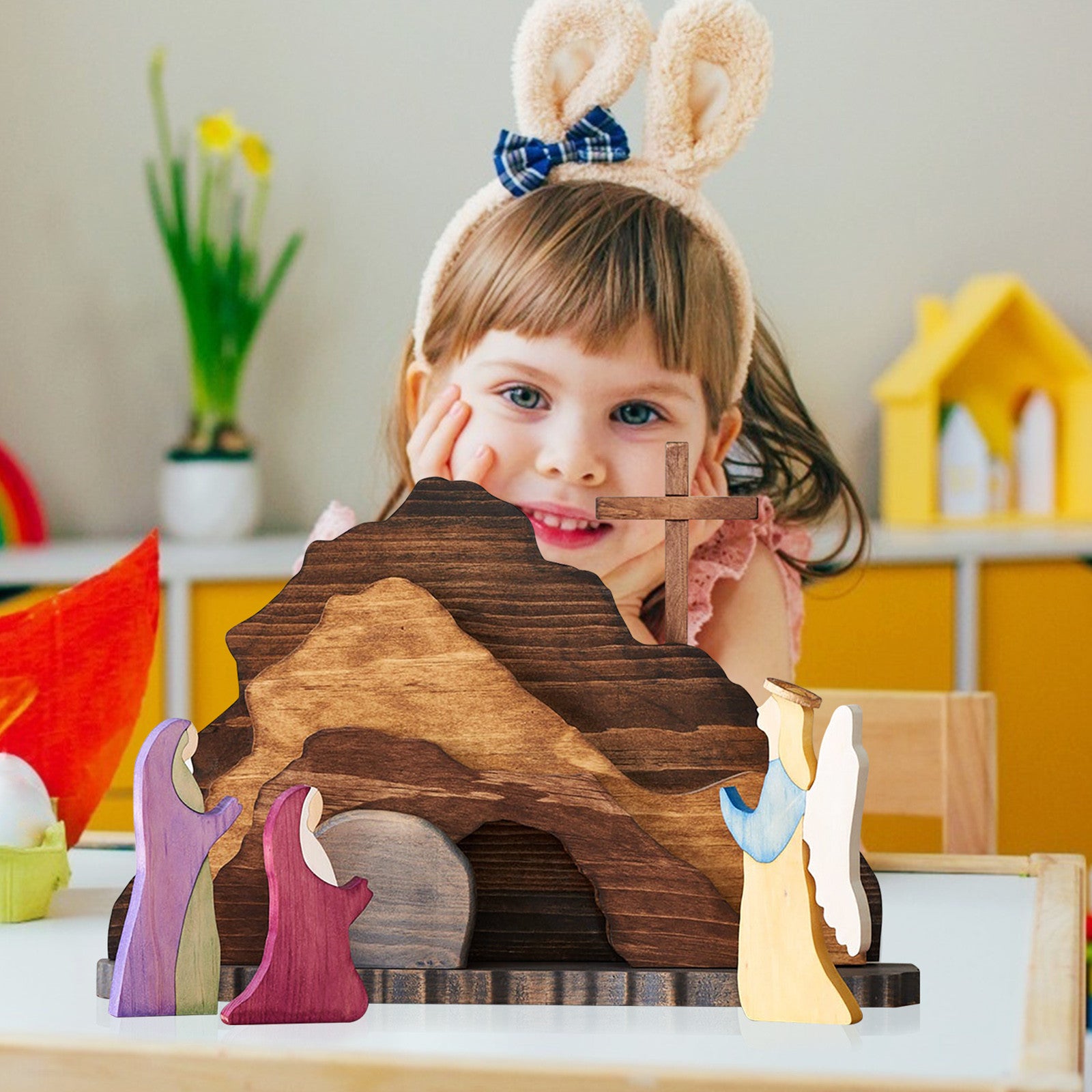 Close-up view of wooden creche figures depicting the Holy Family